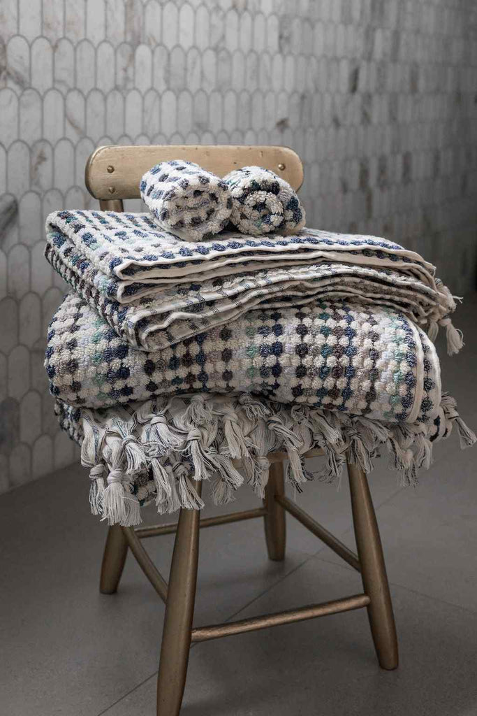 Eucalyptus Bathroom Set in plush Turkish cotton with a multicoloured green, blue, grey and white woven pattern and tassel trim