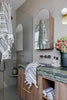 Eucalyptus Bathroom Set in white Turkish cotton with blue, grey and green woven diamond patterns and hand-tied tassels