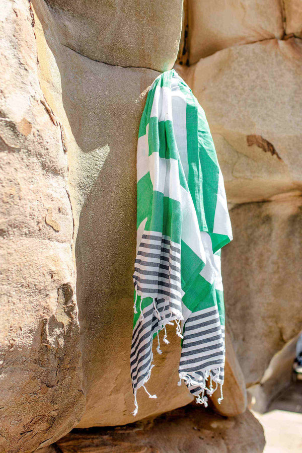 Apple green and navy striped Flamenco Turkish towel with tassels