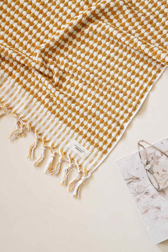 mustard yellow Turkish cotton bathroom towel set with pompom details