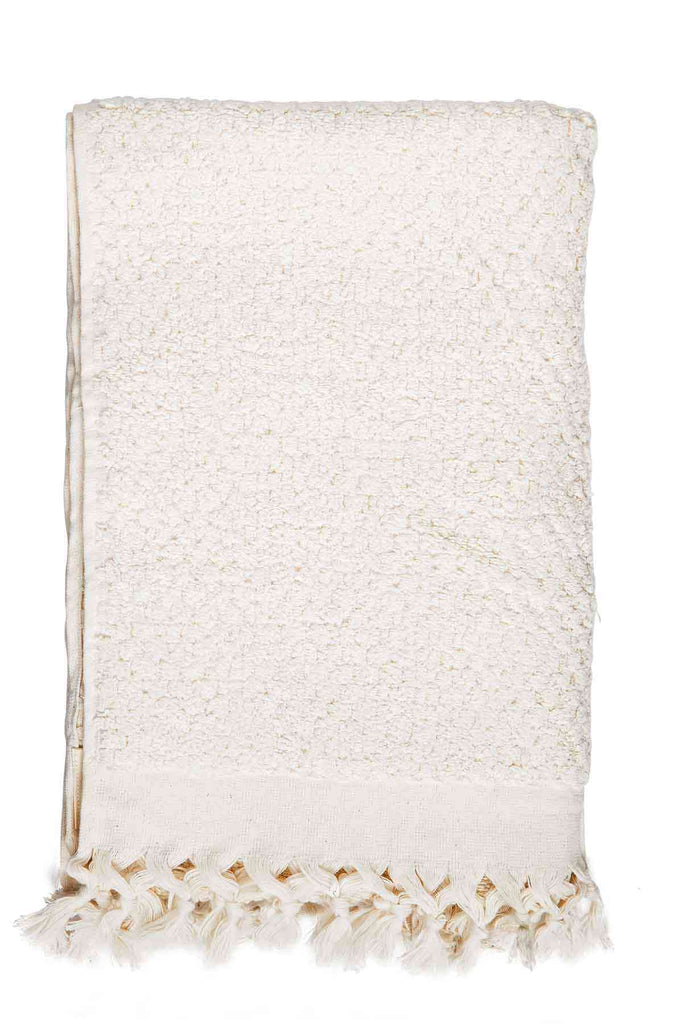 beige natural bathroom towel set with Turkish cotton towels and bath mat