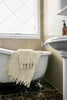 beige natural bathroom set with Turkish cotton towels and bath mat