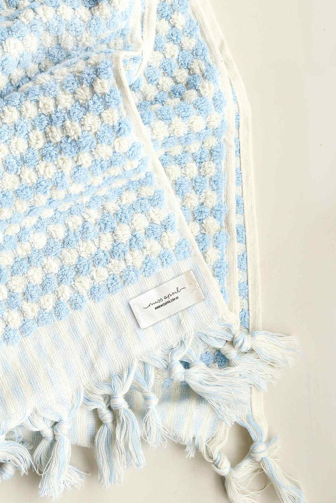 pale blue pompom bathroom towel set with coastal design