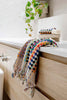 Colorful pompom Turkish cotton hand towel in candy hues