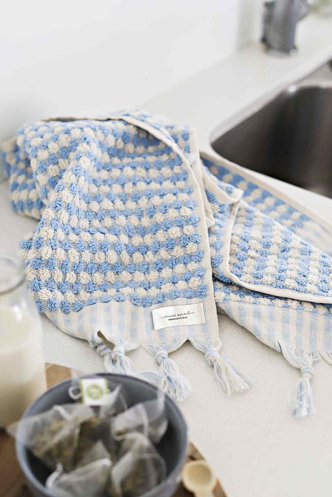 Pale blue Turkish cotton hand towel with white pompoms