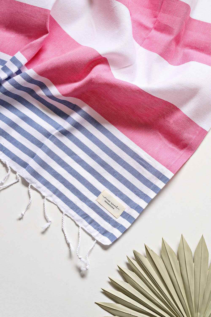 Pink and denim blue striped Flamenco Turkish towel with tassels