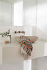 Multicolour vivid lines Turkish cotton towel hanging on bathroom sink